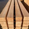 a stack of scottish douglas fir beams