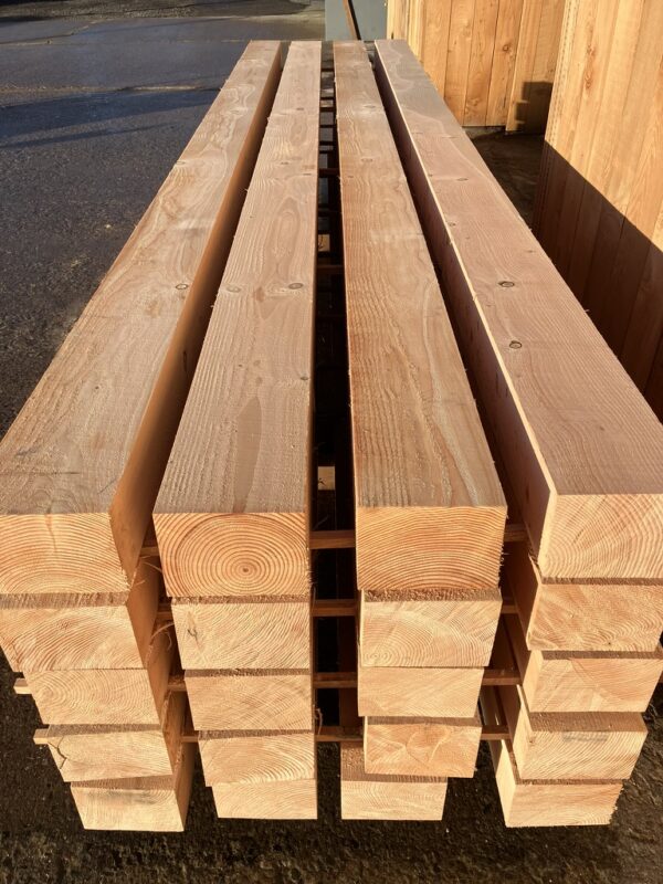 a stack of scottish douglas fir beams