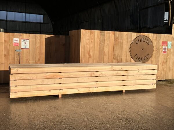 a stack of scottish douglas fir beams